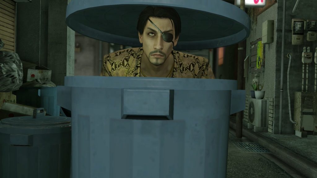 A man in a snakeskin jacket with an eye patch appears out of Tokyo dustbin